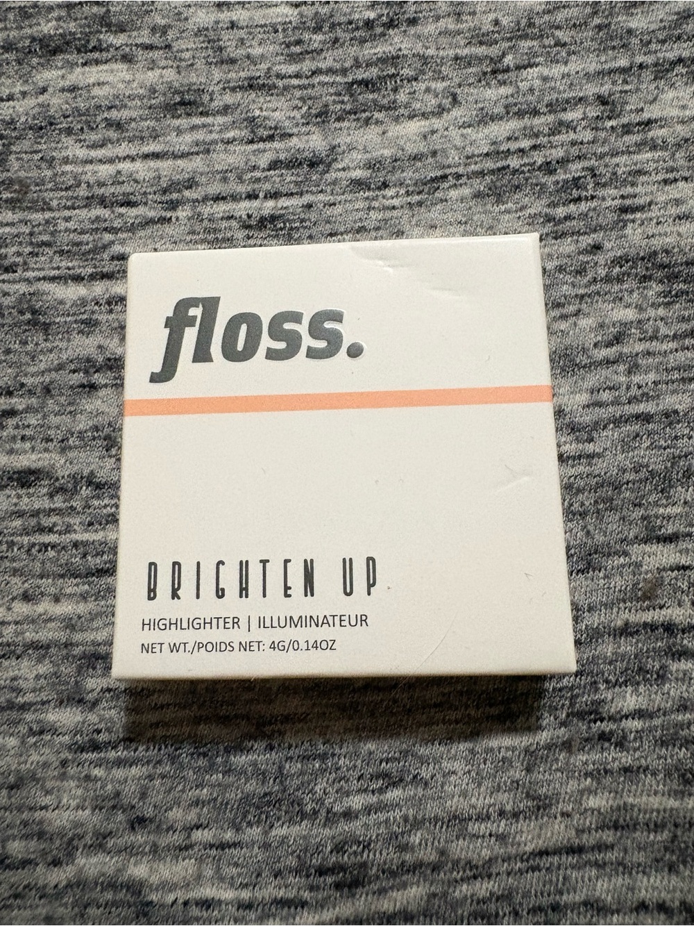 floss. Sunlit Highlighter — White Case with Peach Logo